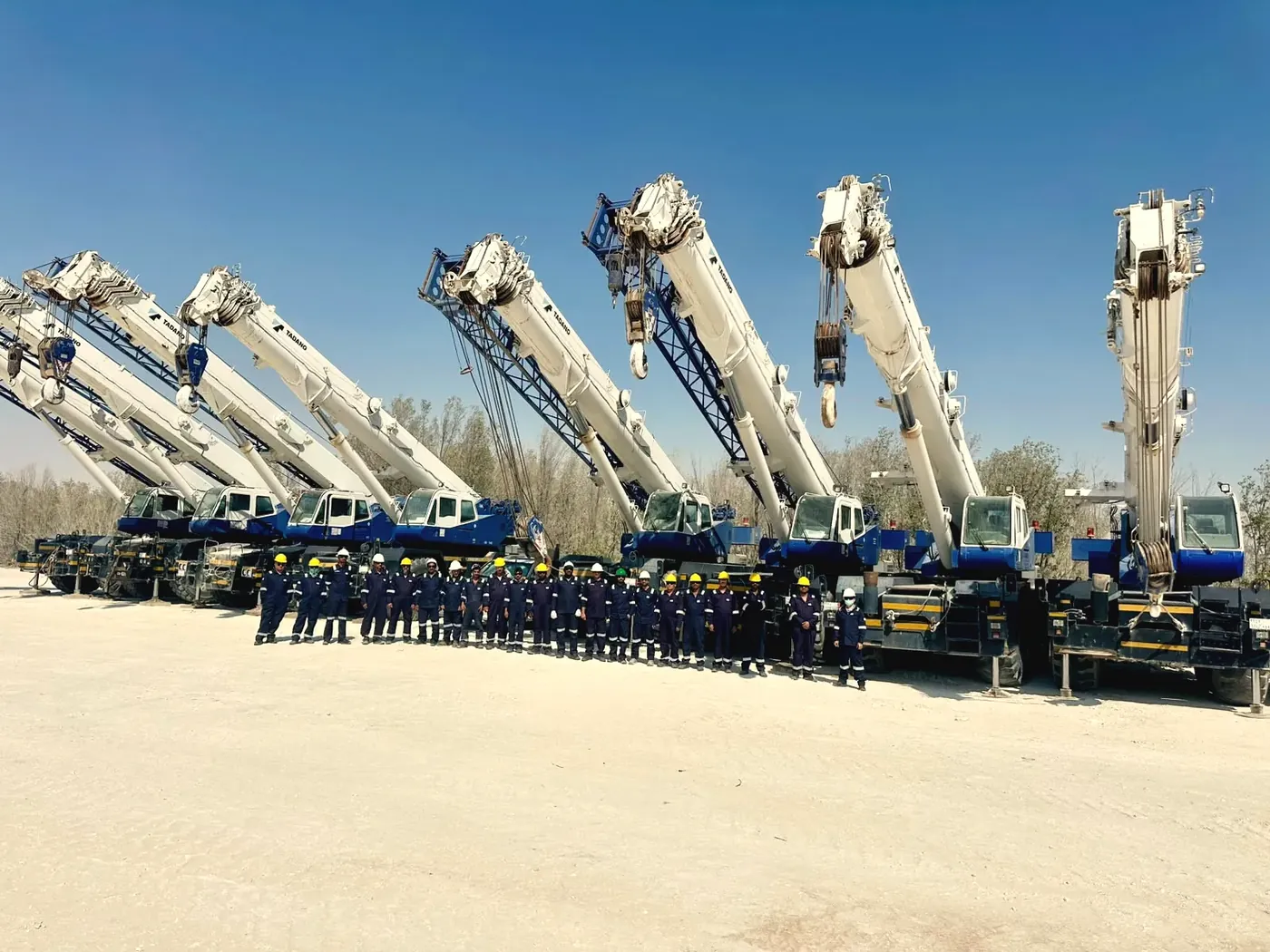 Ajyal's crane and truck fleet lined up in the Al Khobar yard
