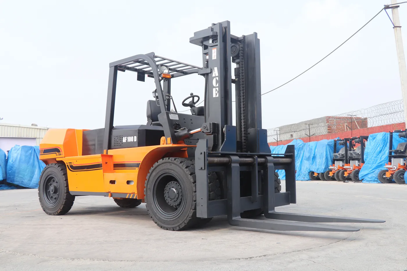 Ten-tonne diesel forklift with forks lowered in an industrial yard